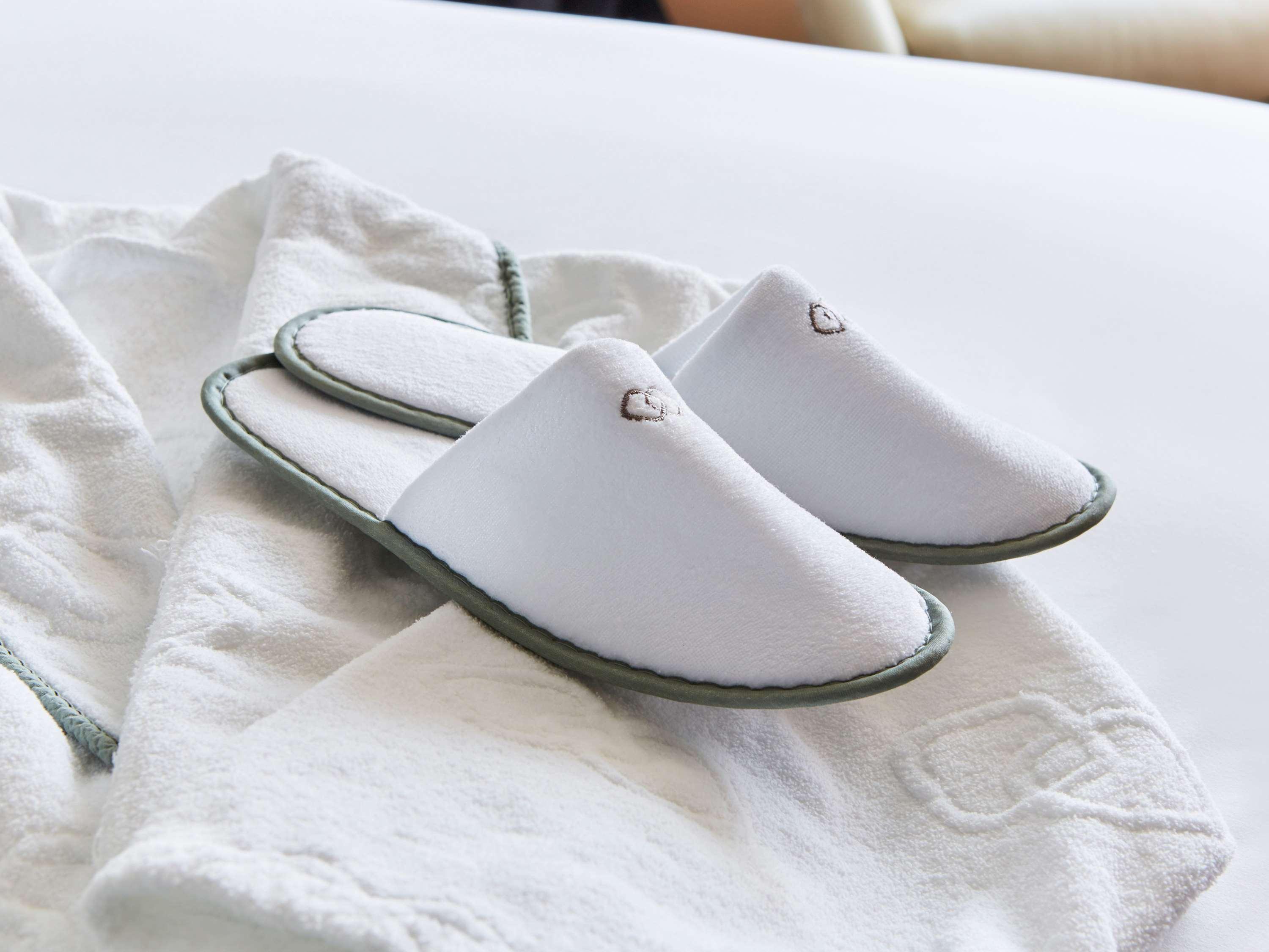 Sofitel Luxembourg Europe Hotel Bagian luar foto A pair of white slippers