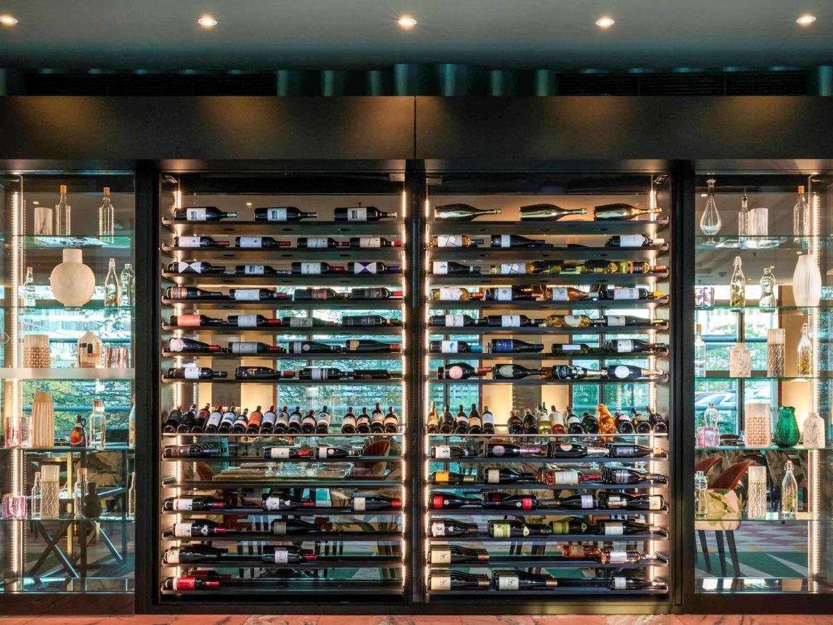 Sofitel Luxembourg Europe Hotel Bagian luar foto Wine display at the restaurant